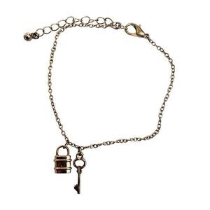 Gold tone lock and key charm chain bracelet